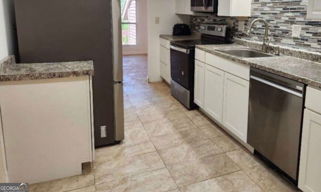 Photo of 2565 Terrace Trail, Decatur, GA 30035 (MLS # 10737295)