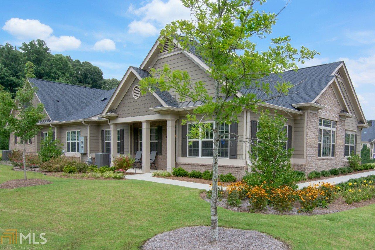 Active adult community - Alpharetta but Forsyth taxes. This home features an open airy floor plan, sunroom, formal dining room, greatroom open to kitchen. Master and guest bedroom on main level. 2nd level features large bedroom - full bath, walk in closet. Located close to shopping, restaurants, and GA 400.