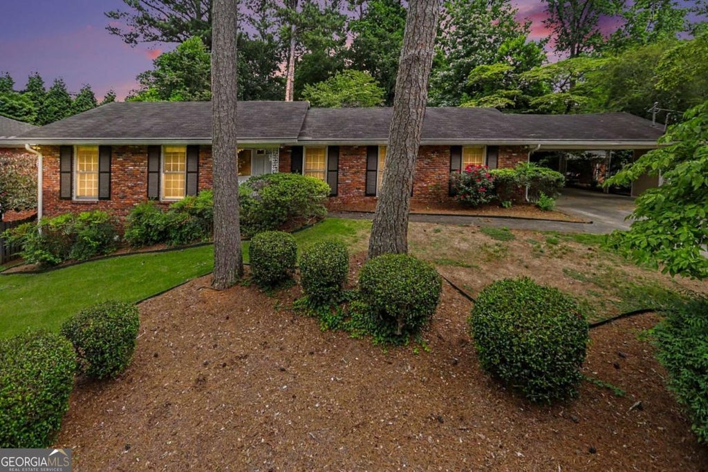 Photo of 4725 Kitty Hawk Place, Atlanta, GA 30342 (MLS # 10794399)
