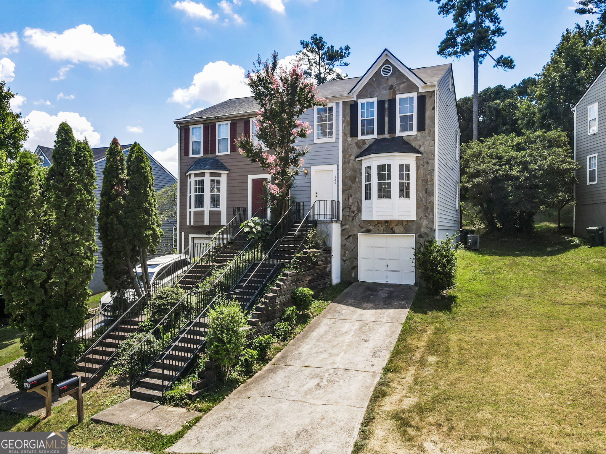 Prime Location in Marietta! This beautifully located townhome is just of Bells ferry Road, with quick access to I-75, to shopping centers, supermarkets, enjoy the dinning experience and entertainment options of Barrett Pkwy. Offering 3 bedrooms , two full bathrooms and a convenient half bath on the main level, this 1462 sq, ft. home also includes a 1-car garage and plenty of storage space. The kitchen feature white cabinets and solid stone countertops . A dedicated laundry room is located upstairs for added convenience. With NO HOA restrictions, this property can either be use as owner-occupant or investors looking to rent and build equity.