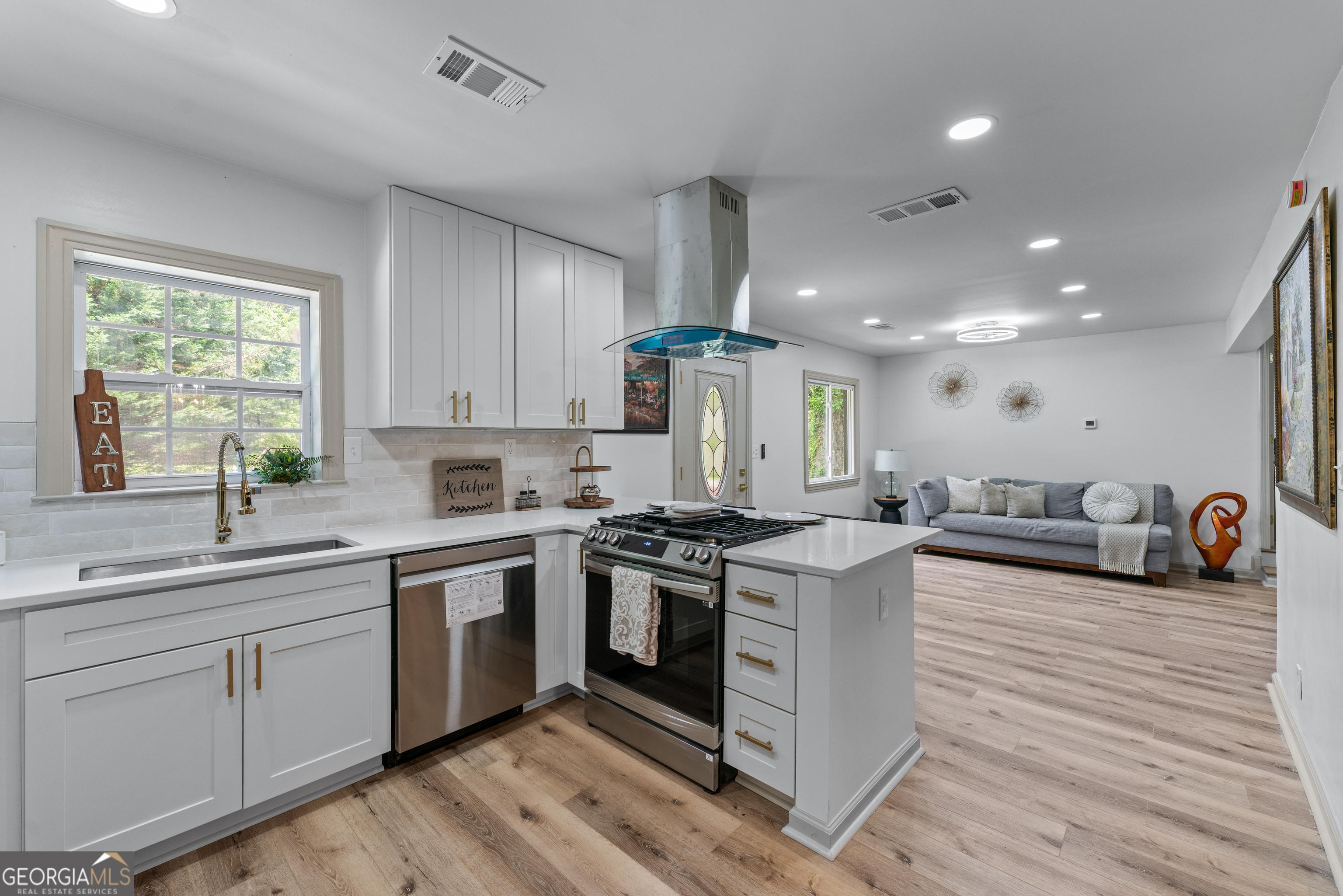 Imagine living in a fully renovated home with open, light-filled spaces that invites you to enjoy every corner. This gem in Marietta blends elegance, functionality, and a real opportunity to generate income from day one. It features a brand-new roof with a 35-year warranty, quartz countertops, luxury finishes, and a modern kitchen perfect for gatherings and daily living. Its spacious bedrooms provide the comfort anyone deserves, and the private suite with separate entrance, full bath, and laundry is ideal for rental income, hosting guests with privacy, or muti-generational living.. The main living area remains separate, offering control, tranquility, and flexibility. No HOA, ample parking, and a prime location near Truist Park, The Battery, I-75, Cumberland Mall, and Marietta Square. Perfect for individuals, small households,multi generation, or investors seeking monthly income. Live in comfort while your home pays for itself-don't miss this gem!