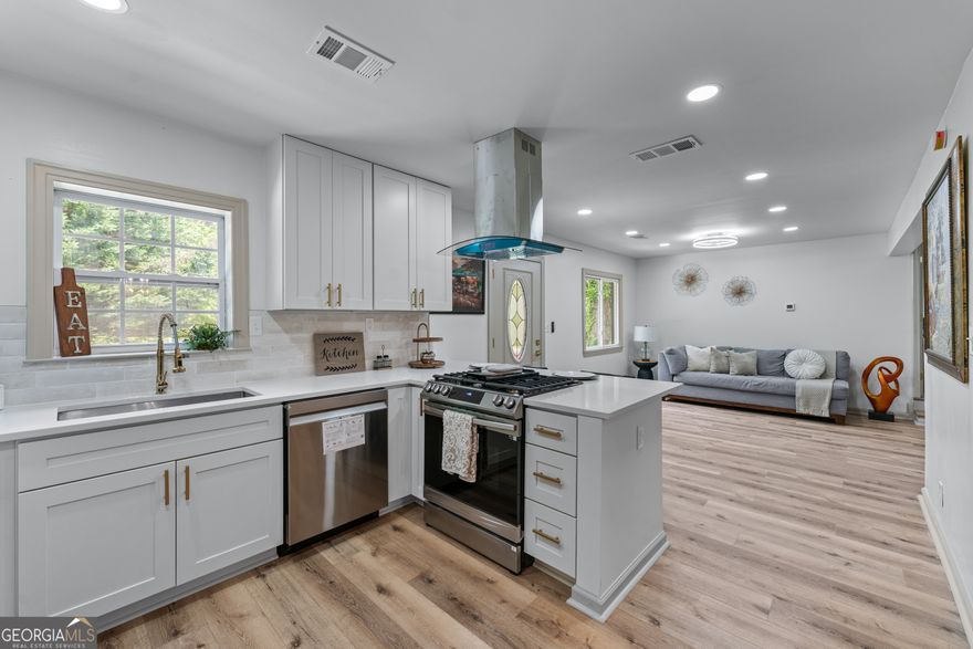 Imagine living in a fully renovated home with open, light-filled spaces that invites you to enjoy every corner. This gem in Marietta blends elegance, functionality, and a real opportunity to generate income from day one. It features a brand-new roof with a 35-year warranty, quartz countertops, luxury finishes, and a modern kitchen perfect for gatherings and daily living. Its spacious bedrooms provide the comfort anyone deserves, and the private suite with separate entrance, full bath, and laundry is ideal for rental income, hosting guests with privacy, or muti-generational living.. The main living area remains separate, offering control, tranquility, and flexibility. No HOA, ample parking, and a prime location near Truist Park, The Battery, I-75, Cumberland Mall, and Marietta Square. Perfect for individuals, small households,multi generation, or investors seeking monthly income. Live in comfort while your home pays for itself-don't miss this gem!