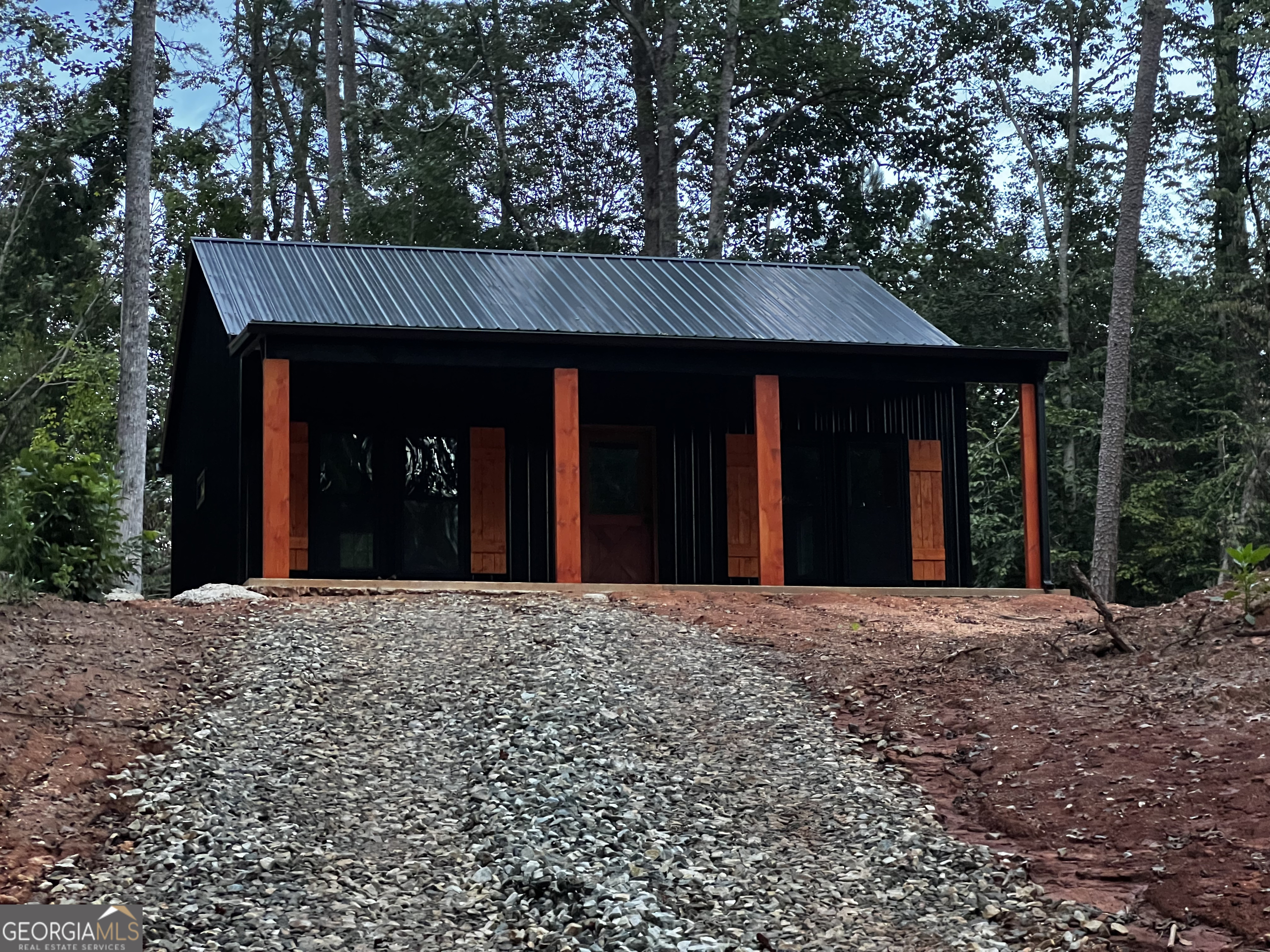 Investors/DIY, 2BR 2BA Barndo that has been completed on the outside including septic and water that will be installed soon! Rough-in plumbing has been done and have plans to finish the inside.