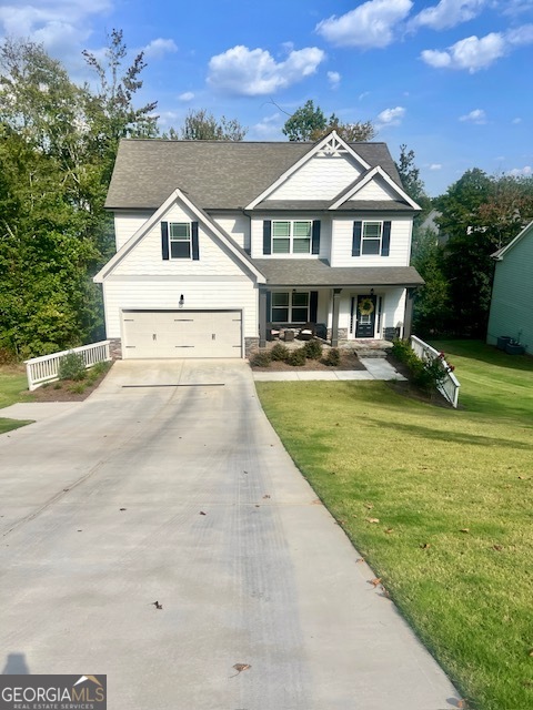 Beautiful opportunity in the desired Windsor Forest development! Spacious 4 Bedroom Home! Full Basement is ready for your expansion and ideas! 2 Car Garage! Updated Kitchen boasting white Cabinets, Quartz Counters, Stainless Steel Appliances, Wall Oven, Gas Cooktop & Much more! Large Family Room with Fireplace and tons of windows! Elegant Entry Foyer and Formal Dining Room with accent wall! Beautiful Master Suite upstairs with Trayed Ceilings! Master Bath has all it all... Double Vanities, Tiles Shower, Garden Tub and more! Window Blinds Throughout the house! Covered Rear Porch overlooking Private Backyard! Very clean inside and out! All Appliances sold with home! Gainesville City School district! Windsor Forest is a fabulous community that is close to everything! This one is a must see.