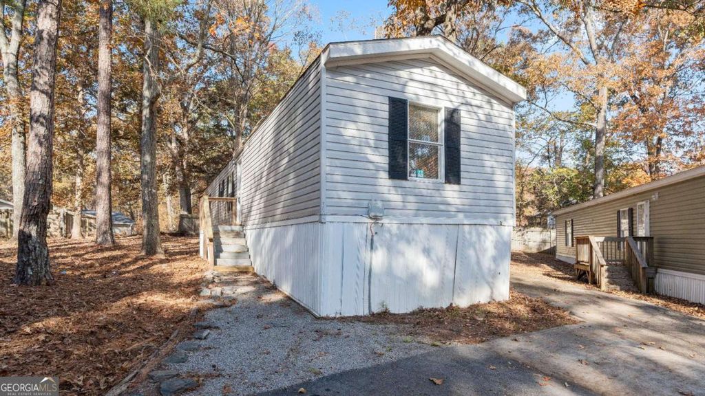 Photo of 6266 DORSETT SHOALS Rd #302, Douglasville, GA 30135 (MLS # 10720870)