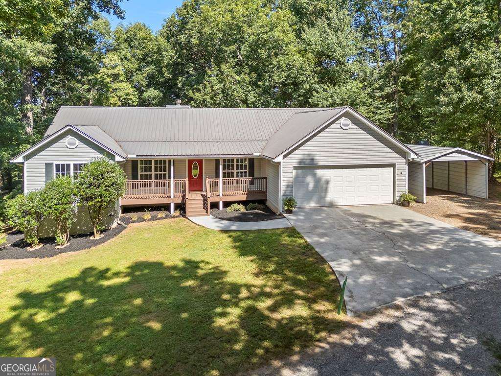 Welcome to Your Mountain Oasis at 311 Deerwood Trail Road, Blairsville, GA!Discover the perfect blend of modern luxury and serene mountain living in this fully renovated 3-bedroom, 2-bathroom single-level home with a versatile study, nestled in the heart of Blairsville. Just minutes from Lake Nottely and conveniently close to town, this stunning residence offers accessibility, comfort, and endless possibilities for families, retirees, or anyone seeking a peaceful retreat.Step inside to find all-new flooring, designer lighting, and a gourmet kitchen that's a chef's dream, complete with sleek countertops, modern cabinetry, and brand-new appliances. The open-concept living area flows effortlessly, creating a warm and inviting space for gatherings. The master suite is a true sanctuary, boasting an exquisite tiled shower that elevates your daily routine to a spa-like experience.Outside, a fenced-in backyard provides a safe haven for pets, play, or relaxing under the stars, surrounded by the beauty of the North Georgia mountains. With its accessible layout and thoughtful upgrades, this home is move-in ready and designed for easy living.Whether you're dreaming of cozy mountain evenings, outdoor adventures on Lake Nottely, or a forever family home, 311 Deerwood Trail Road delivers it all. Don't miss your chance to own this gem-schedule your tour today and start living the mountain life you've always imagined!