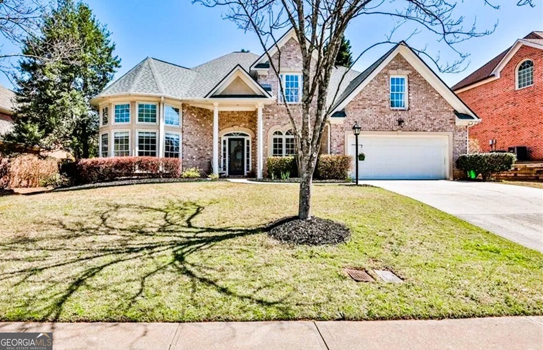 Discover this stunning 5-bedroom, 4 full-bath home in Highcroft community of Peachtree Corners. This beautifully maintained home is move-in ready and offers the perfect blend of space, comfort, and style. This home is thoughtfully designed for both everyday living and entertainment, featuring a big bright open concept kitchen that flows into a spacious family room with cozy fireplace and breakfast area. Separate dining and another family rooms with the option to convert into the office offers additional versatility. A guest bedroom and full bathroom on the main level provide ideal flexibility. Sunroom and patio with nice, fenced back yard to relax or entertainment. Primary bedroom with three more bedrooms and three full baths upstairs. Freshly painted inside and out. New flooring on main and upper levels. You'll enjoy top-notch community amenities including a pool, tennis courts, and a playground just minutes from Peachtree Corners Town Center and The Forum Outdoor mall, enjoy concerts, festivals, shopping, dining, fitness parks, splash pads, and more-everything you need to live, play, and thrive. Don't miss this opportunity. This house isn't just a house-it's a lifestyle in one of the dynamic locations.