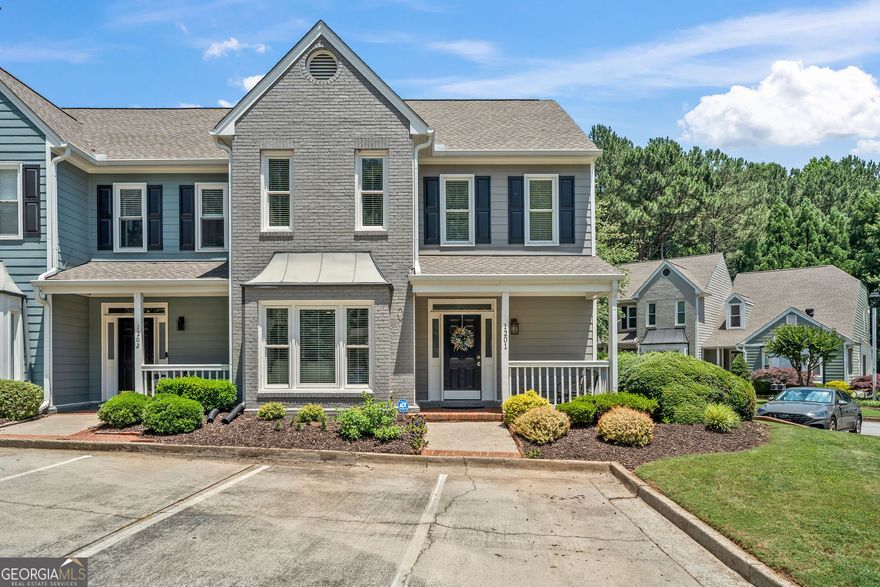 If you've been dreaming of living just around the corner from Sandy Springs while enjoying the benefits of Cobb County taxes and being zoned for top-tier schools like Sope Creek Elementary, Dickerson Middle, and Walton High, then look no further. Just cross the river on Johnson Ferry and step into a lifestyle that offers both convenience and charm. Situated in the beautifully updated Mulberry Farms community, 1201 Bridle Path is a meticulously cared-for end-unit townhome that feels like home the moment you walk in. The entire neighborhood has recently undergone exterior renovations, giving it a fresh, modern look and added value. Inside, you'll find two generously sized bedroom suites upstairs, offering comfort and privacy. The main level features a bright and inviting living room with a cozy fireplace, perfect for relaxing or entertaining, and it opens to a private patio and backyard. The formal dining area adds elegance, while the kitchen offers a quaint breakfast nook surrounded by natural sunlight, creating a warm and welcoming atmosphere throughout. With a prime location, excellent schools, and easy access to major highways, this home truly has it all. Don't miss your chance and schedule your private showing today or call your agent to be among the first to see 1201 Bridle Path. This is more than just a home, it's your next chapter.