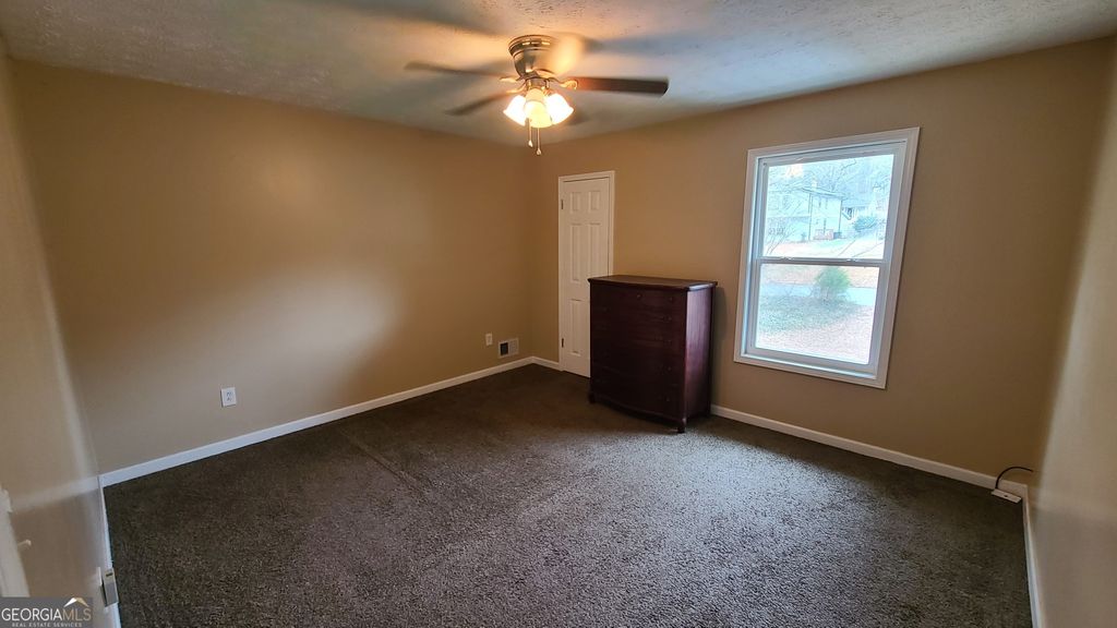 Photo of 4158 Valley Brook Road, Snellville, GA 30039 (MLS # 10759042)