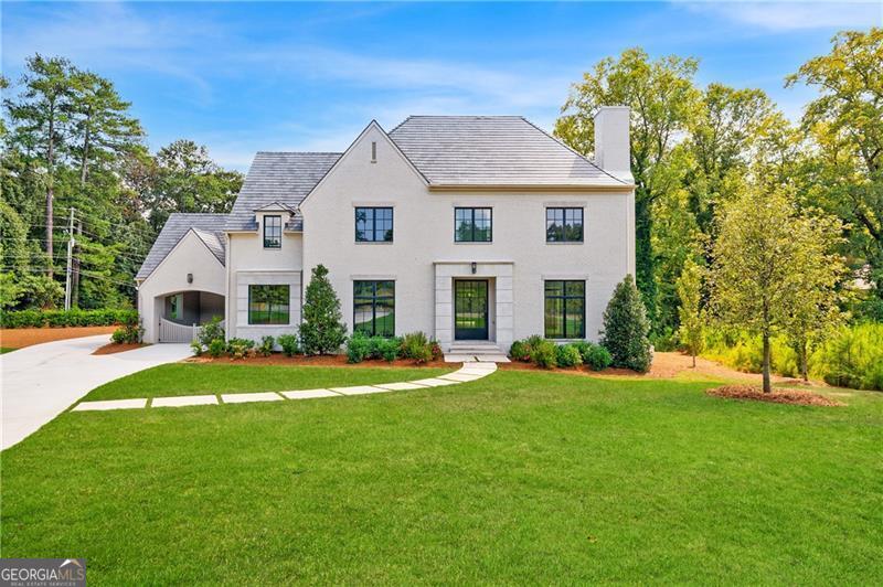 Thoughtfully design new construction Phillip Clark Custom Homes. Located in a great cul-de-sac with only 8 homes, minutes away from Buckhead private schools, Jackson Elementary, retail, restaurants and Chastain Park. Upon entering through the oversized front iron entry door, the foyer leads to formal living room with fireplace, separate dining room and wet bar. The light filled kitchen and great room in the rear of the home feature accordion doors opening to the covered porch, perfect for entertaining. Additionally, there is a separate scullery/prep kitchen, laundry room, mudroom and two half baths. The oversized primary suite on the main level features separate dual baths and dual walk-in closets. The main staircase leads to 4 bedrooms all with en-suite baths each beautifully finished. The terrace level has unlimited opportunity for an additional bedroom/bathroom, bonus spaces for gym, home theater or golf simulator room. Ample covered parking with a carport with a side entry into the kitchen as well as a 3 car garage with opportunity to expand above. Great private, level backyard with ample space for a pool. Truly a must see in Buckhead!