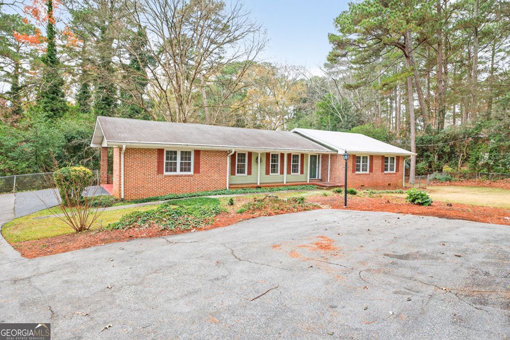 Photo of 5297 Hugh Howell Road, Stone Mountain, GA 30087 (MLS # 10655741)