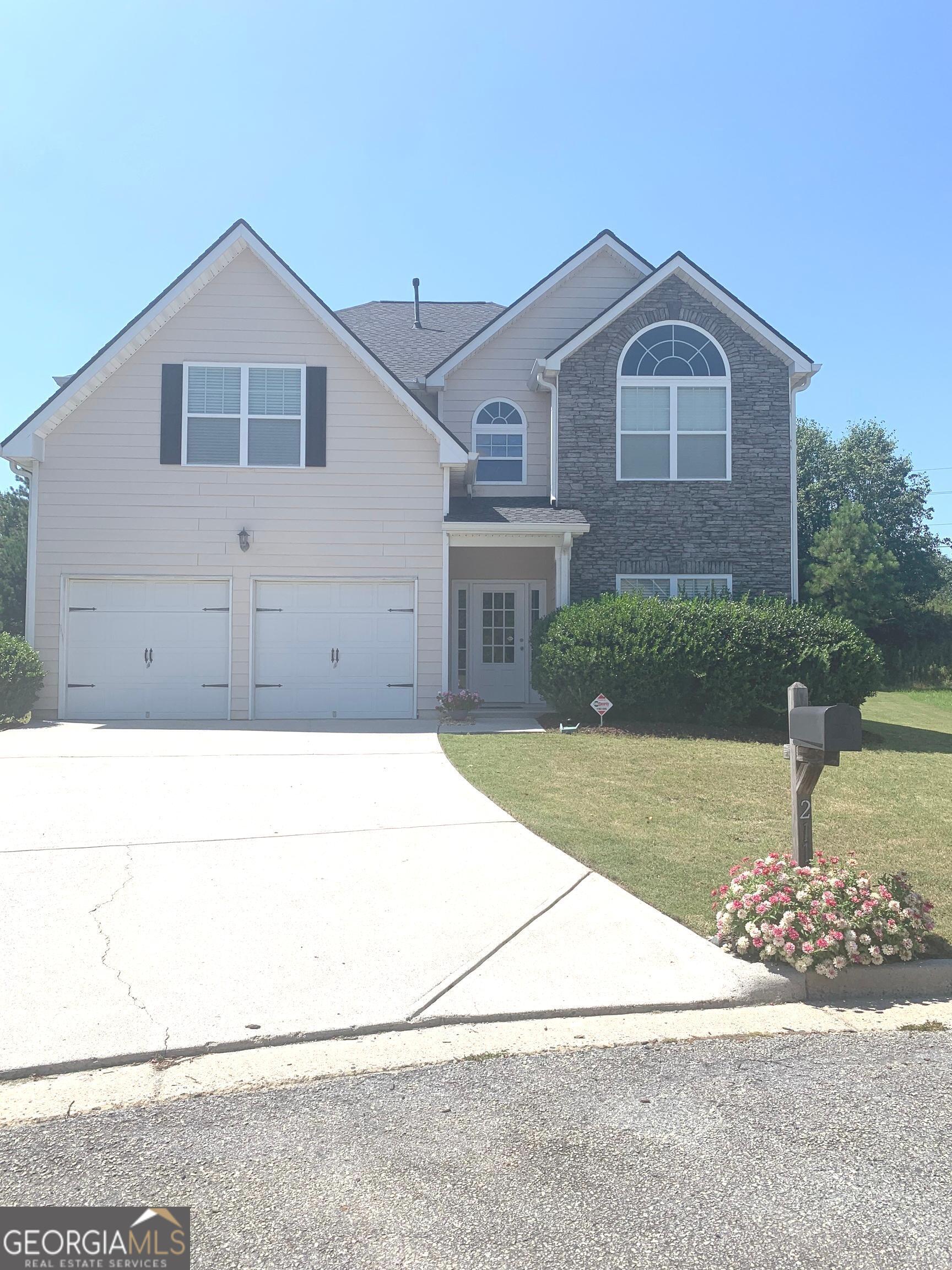 LOOKING FOR THE MOST IMMACULATE, MOVE-IN READY HOME IN WATER MILL? This home is IT!! Why? Because it's sooo lightly lived in that it feels like it's BRAND NEW inside!! The original owner has taken pristine care of the property -- both inside and out. When you come to tour the home, you'll find high end, luxurious, elegant finishes throughout. The 5-bedroom, 3-bath, open double foyer home boasts a spacious dining room with trey ceiling as well as an open concept kitchen and living room area. The very generous master suite occupies one entire side of the upstairs with a bedroom/sitting area, 3 closets, and a luxurious bathroom. The 4 additional bedrooms have Never been used so the paint and carpet are like new. Additionally, the appliances, washer and dryer have seen minimal use. The blue protective plastic is still on the washer and dryer and the description tag is still in the refrigerator! The home has true hardwood floors, immaculate carpets in the living room and bedrooms for added comfort, and ceramic tiles in the bathrooms. For efficiency, you'll find LED lighting throughout both levels. A home security system from Jackson EMC is in place if you would like to continue the service. High speed internet is also available. The grounds are level all around and offer a very large backyard area to develop into whatever type of outdoor living space you want. Some of the additional subdivision amenities include a playground, pool, clubhouse, and tennis courts. Conveniently located to shopping, restaurants, and I-85, you'll find LOTS to love about living at 2118 Water Mill Court! Schedule your visit to tour this terrific home!!