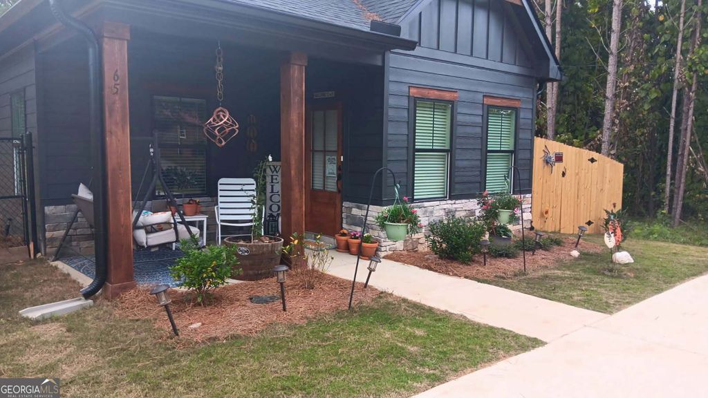 Photo of 65 Magnolia Street, Buchanan, GA 30113 (MLS # 10703477)