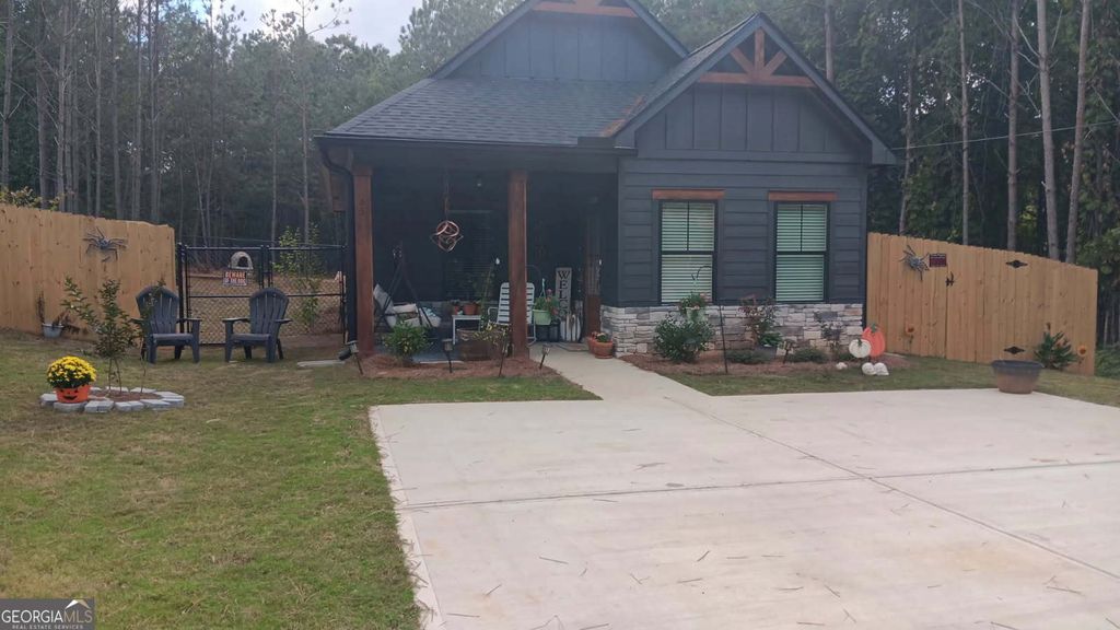 Photo of 65 Magnolia Street, Buchanan, GA 30113 (MLS # 10703477)