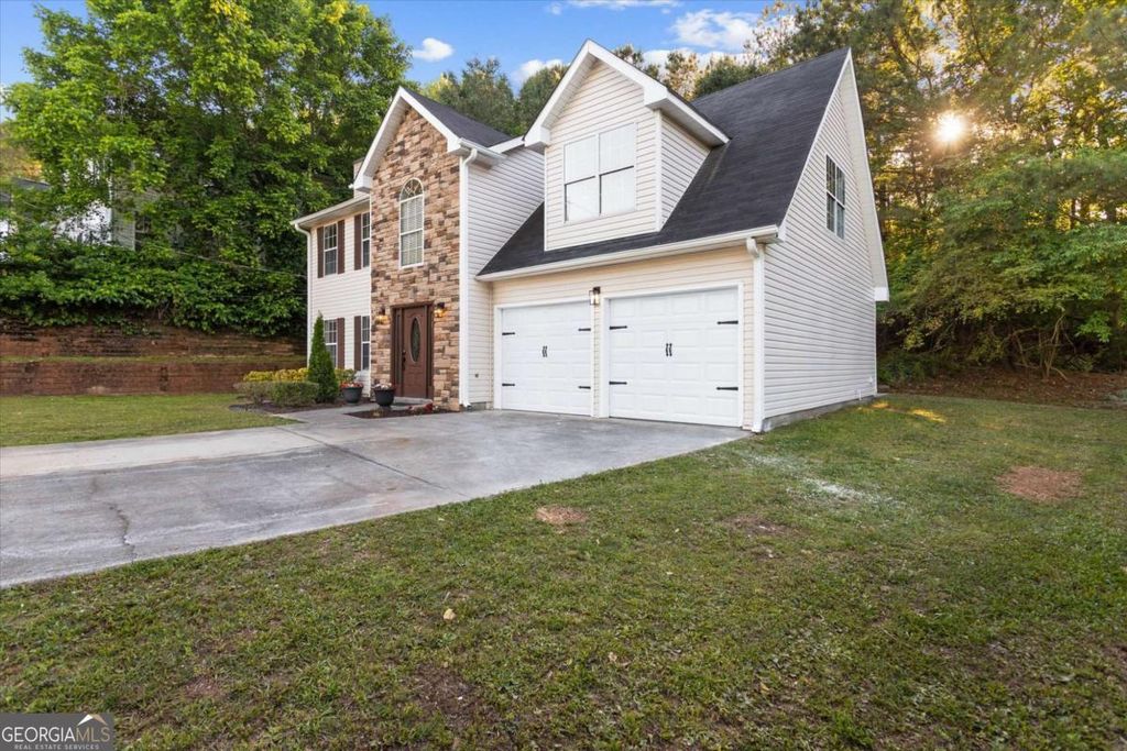 Photo of 3897 Creek Shoals Ln, Ellenwood, GA 30294 (MLS # 10758655)