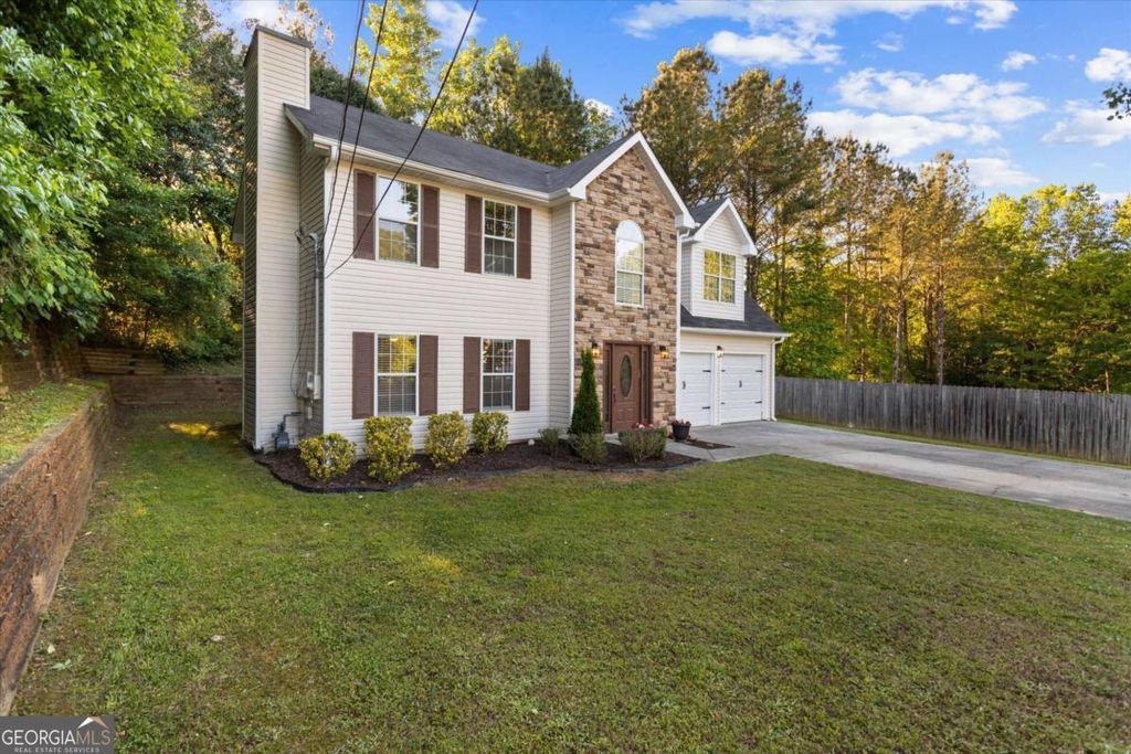 Photo of 3897 Creek Shoals Ln, Ellenwood, GA 30294 (MLS # 10758655)