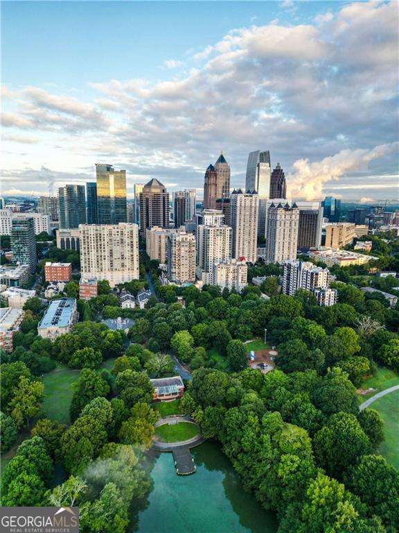 Prime Midtown redevelopment opportunity at the edge of Ansley Park. Discover a remarkable redevelopment opportunity at 56 17th St NE, located just off Peachtree Street and serving as the gateway to the prestigious Ansley Park. This prime Midtown Atlanta property is uniquely positioned amidst a landscape where buildable land is scarce, especially in coveted areas such as Ansley Park and Midtown. Boasting high-profile visibility, this site offers a rare chance to explore a variety of redevelopment possibilities, including single-family residences, townhomes, boutique condominiums, or a compelling mixed-use project. The property's versatility aligns perfectly with the evolving needs of Atlanta's urban landscape, promising significant potential. Situated within Atlanta's vibrant cultural corridor, the property is enveloped by world-class amenities and cultural institutions, including the High Museum of Art, Colony Square, and the Woodruff Arts Center. Its immediate access to MARTA, the BeltLine, and major interstates further enhances its appeal for future residents or commercial tenants. As Midtown continues to grow as a premier destination for technology, arts, and urban living, this site offers an unparalleled opportunity to invest in one of the city's most dynamic and connected neighborhoods. Seize the opportunity to shape the future of Midtown Atlanta with this exceptional redevelopment site.