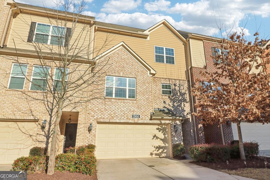 ***HIGHLY MOTIVATED SELLER, bring all offers!!*** Seller willing to pay closing costs. Gorgeous newer townhome in the gated community of Glen Ivy! First floor features a spacious living/guest room with an en-suite bath and back deck access as well as a lovely herringbone tile floor. Use this space for guests with the murphy bed, or make it into a man cave/craft room/playroom! Upstairs, the bright and open concept living room features 9-foot ceilings and hardwood floors. Step outside to the large deck with plenty of room for seating and enjoy private wooded views. The on-trend kitchen has bright white cabinets, granite counters, tile backsplash, stainless steel appliances, breakfast bar, and large dining area. Upstairs, retreat to the primary suite with tray ceilings and an en-suite bath with dual sinks, soaking tub, new separate walk-in shower, and a walk-in closet. Spacious secondary bedroom has an en-suite bath as well! Located with easy access to I-75, it offers convenient access to Truist Park, shopping, and all that the vibrant Marietta Square has to offer. Community amenities include a pool and dog park. Don't miss out on this incredible opportunity to live in a highly sought-after location with easy access to everything you need!