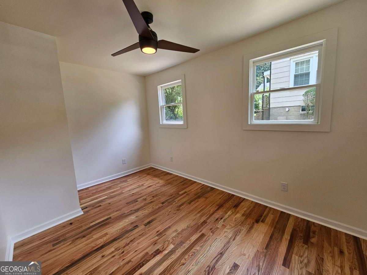 Charming bungalow on a huge lot. Site-stained hardwood floors for added character and presentation. Fireplace completely redone and anchors the family room as a showpiece. Arched doorways give an old-world flair with traditional features and new technology! New paint and light remote-controlled light fixtures throughout. Family room with aged fireplace and a modern hearth. All kitchen appliances are brand new! White shaker cabinetry with satin hardware. Electric range with stainless downdraft. Island with dual pendant lights overlooking a breakfast bar. Separate dining area great for a bistro table setup. Laundry room for stackable Washer/dryer or combo. Secondary bedrooms have new ceiling fans, paint and flooring. Hall bathroom has 3D ivory tile, marble flooring, oil rubbed bronze hardware and frameless glass enclosure being installed. Owner's suite is separate and tucked in the rear of the home. The closet is a room by itself!!!! Owner's bath has an oversized black marble tiled shower with frameless shower door. Water closet along with a dual vanity sinks and hip mirrors accented with oak surround. Backyard is huge and ready for entertaining. **DO NO DISTURB TENANTS!!!**