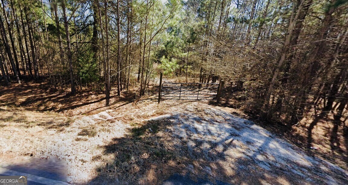 LAND LOCATED IN DESIRABLE FAYETTE COUNTY WITH AWARD WINNING SCHOOLS, MINUTES FROM PINEWOOD/TRILITH ATLANTA STUDIOS AND EVER EXPANDING HARTSFIELD JACKSON ATLANTA INTERNATIONAL AIRPORT PLUS EASY ACCESS TO INTERSTATE-85. Rare opportunity to build your custom dream home on a 2 acre lot. Optional HOA without restrictions. Previous homes built in the neighborhood are over 4500 SQFT. Ask about the option to produce this with our lender's single-site development financing program. Let's bring your vision into fruition!!