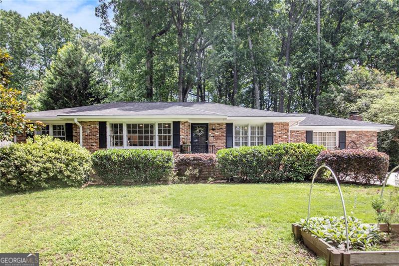 Beautiful updated home in desirable Brookhaven neighborhood under 700K! Located in desirable Montgomery Elementary district! One level living in this lovely brick ranch home with private fully fenced backyard oasis with additional storage and large level patio perfect for entertaining. Large, .7 acre lot offers plenty of space in both the back and front yard with plenty of privacy from the main road. Gleaming hardwood through most of the home with tile in the spacious, fireside den. Renovated kitchen boasts white cabinets, stainless appliances, beverage cooler and granite countertop. Generous primary bedroom has built-in wardrobes and an en-suite bath with shower. Two guest bedrooms share a hall bath with tub/shower combination. The front entrance rooms offer flexibility in use from a home office space or children's play room and are filled with a peaceful array of natural light. The possibilities are endless! The convenient location provides quick access to 285, 85 and 400, as well as Perimeter, the heart of Brookhaven and Buckhead. R-30 insulation installed for efficiency approximately 7 years ago. This GEM is not to be missed for your opportunity to own in the desirable and growing community of Brookhaven where equity and home values are increasing every year. Brand new HVAC installed in 2025. New ceiling fans installed in all 3 bedrooms and in laundry room in 2023 Replaced water line (from street to home) in 2024 New kitchen faucet installed in 2024 May / June 2025 - new HVAC installed Powerwash of gutters, driveway, walkways and shed Air ducts and vents cleaned and deodorized.