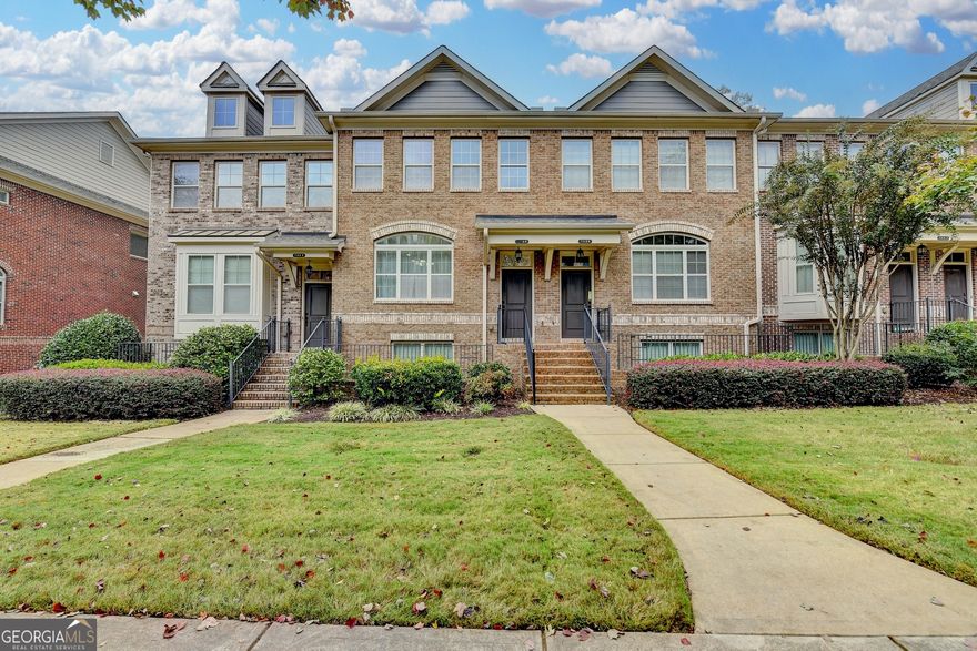 Beautifully upgraded town home is sought-after Jamestown -- Alpharetta's Favored Gated Community! Welcome to your dream home in Jamestown, one of Alpharetta's most desirable gated communities located in Forsyth County -- just moments from Halcyon, Avalon, and vibrant downtown Alpharetta. This 3-bedroom, 3.5-bathroom residence perfectly blends modern comfort, smart home technology, timeless style. Step through the charming front entry overlooking a serene, landscaped garden courtyard, and enjoy an inviting sense of tranquility that continues throughout the home. The evergreen wooded backdrop in the rear adds a touch of privacy and natural beauty to your daily life. Inside, you'll find freshly painted interiors in a soft antique white, upgraded hardwood floors, and ceramic tile in the kitchen and baths. The chef's kitchen is a true delight with stainless steel appliances, a counter-depth refrigerator, a convection oven, a microwave, and a newer LG dishwasher. The breakfast island comfortably seats three and opens to a spacious family room with a gas fireplace, creating the perfect flow for entertaining or relaxing. Step outside onto the deck with peaceful wooded views-- your own private retreat! Upstairs, the luxurious owner's suite impresses with a trey ceiling, large walk-in closet, and spa-inspired bath featuring dual vanities, a frameless glass shower, soaking tub, and vaulted ceilings. This home offers the latest in smart home living-- including a ring doorbell camera, smart light switches and bulbs, and a Daikin 3-zone HVAC system (only 1 year old) with a smart programmable thermostat and blue-light air purification system for ultimate comfort and efficiency. Living in Jamestown means access to resort-style amenities-- Clubhouse, pool, tennis courts, pickleball, playground, and lighted sidewalks for evening strolls. This home is truly move-in ready and combines luxury, location, and lifestyle in one perfect package. Don't miss your chance to call Jamestown home-- schedule your private tour today!