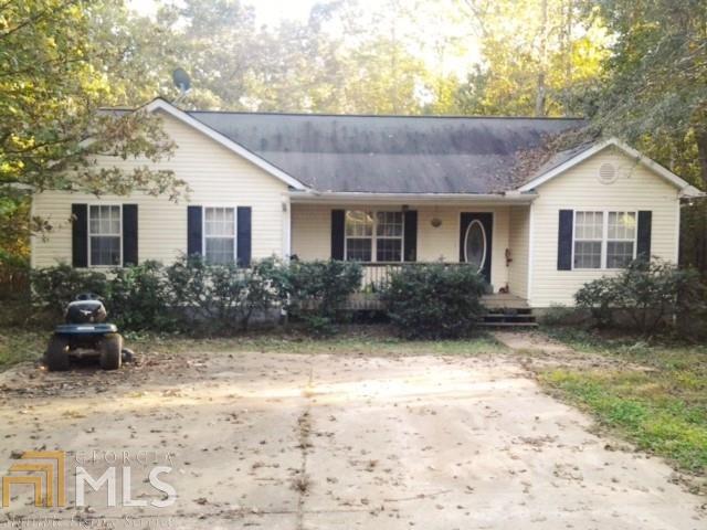 Nice 4 bdrm/2 bath, bachelor occupied, ranch style home on 3 acres. Rocking chair front porch. Split Bdrm Plan. 2 on each side of house. Eat in kitchen. Lots of cabinets. Large Master Bdrm with 2 Large Closets. Master Bath with Garden Tub and separate shower. Linen Closet. Laundry Room in Hallway. Large Backyard. VERY secluded. Long driveway where you can't see the house from the road. Flag lot. Must have appt to view property. No Garage, but room to put one up. Look off the deck on back of house and watch the deer. Look for McLeRoy Sign. VERY Motivated Seller! Make Offer. Call Cathy!