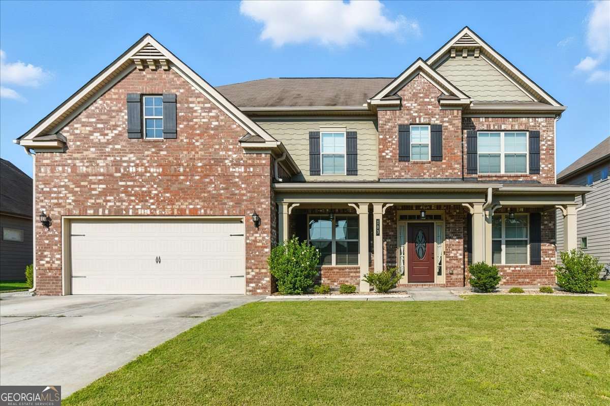 Welcome to 103 Gray Trl, a stunning 5 bed / 4 bath home in a desirable Acworth swim & tennis community. This home features hardwood floors, an open-concept kitchen and living room with granite countertops, stainless steel appliances, and a cozy fireplace. The spacious master suite includes double vanities, a soaking tub, and a separate shower. Additional bedrooms are generously sized, offering comfort for family or guests. Enjoy the fenced backyard with a custom firepit, perfect for entertaining, along with a charming covered front porch. With HOA amenities including pool and tennis courts, plus convenient access to schools, shopping, dining, and major highways, this home offers the perfect mix of style and convenience.