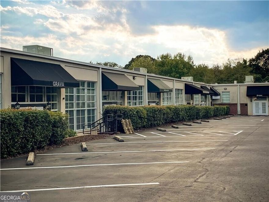 Professional office opportunity in McClaren Mill Office Park, ideally located near Marietta Square with convenient access to I-75 and major corridors. This well-designed unit offers a versatile floor plan tailored to today's business needs. The space features five private offices for focused work, five cubicle offices for collaborative team members, a welcoming entry foyer, and a dedicated conference room perfect for client meetings. Additional highlights include a storage closet and a private restroom, ensuring functionality and convenience for both staff and visitors. Set within an attractive office park with ample parking and professional surroundings, this unit is well-suited for firms seeking a move-in ready space that balances private work areas with open team environments.