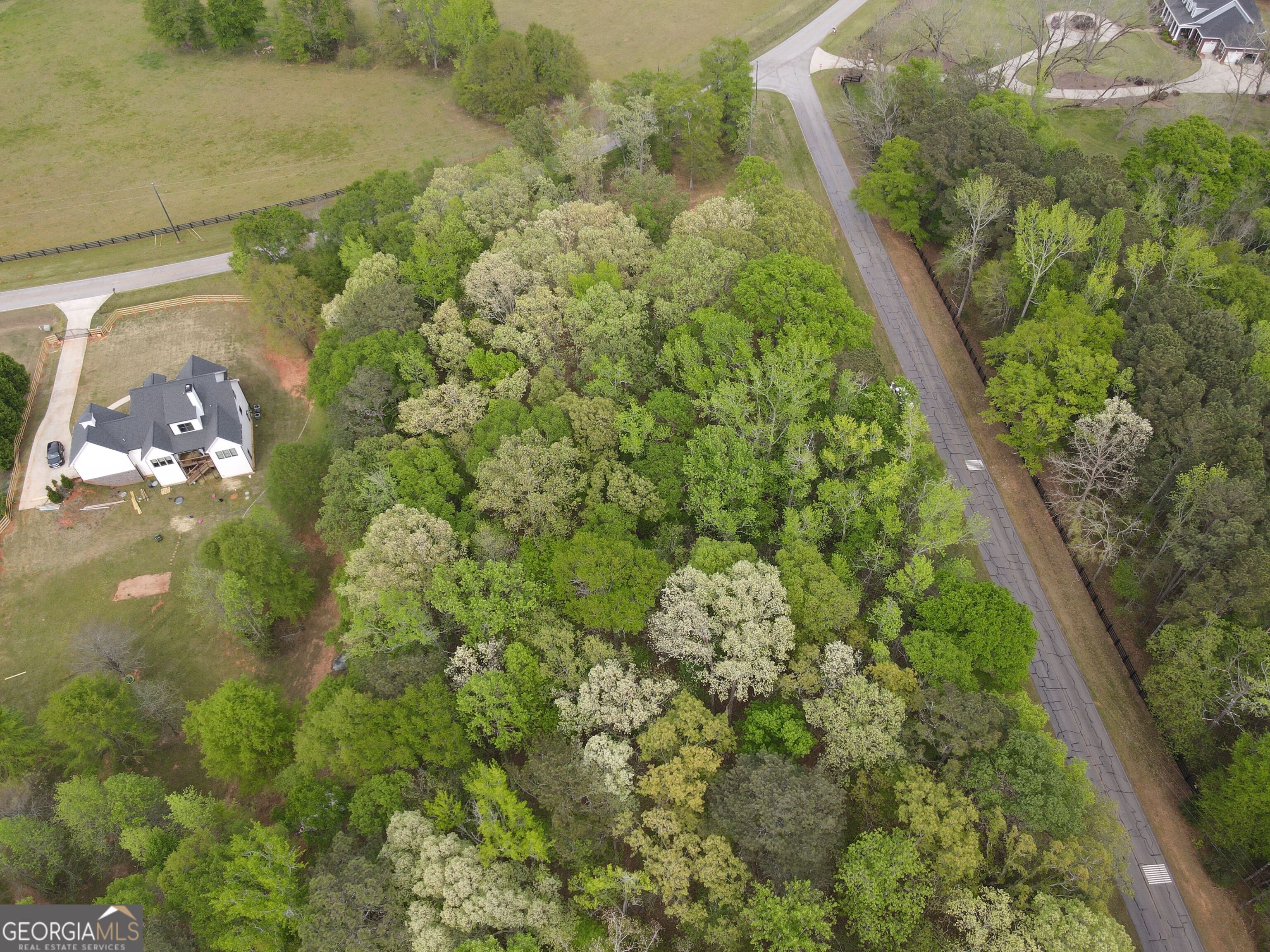 Georgia Premier RE Advisors is pleased to present a 2.04 acre residential lot in the highly coveted Morgan County. This mostly level lot is at the intersection of Brownwood Rd and Knight Rd and has 780ft of total road frontage. The property features some open areas up front with trees on the back side of the property for privacy. A soils report has been conducted on the property showing soils suitable for a conventional septic system. The lot is located only 7.5 miles from Madison and is surrounded by mostly newer homes. Come walk this beautiful lot and enjoy the country while still being close to the city.