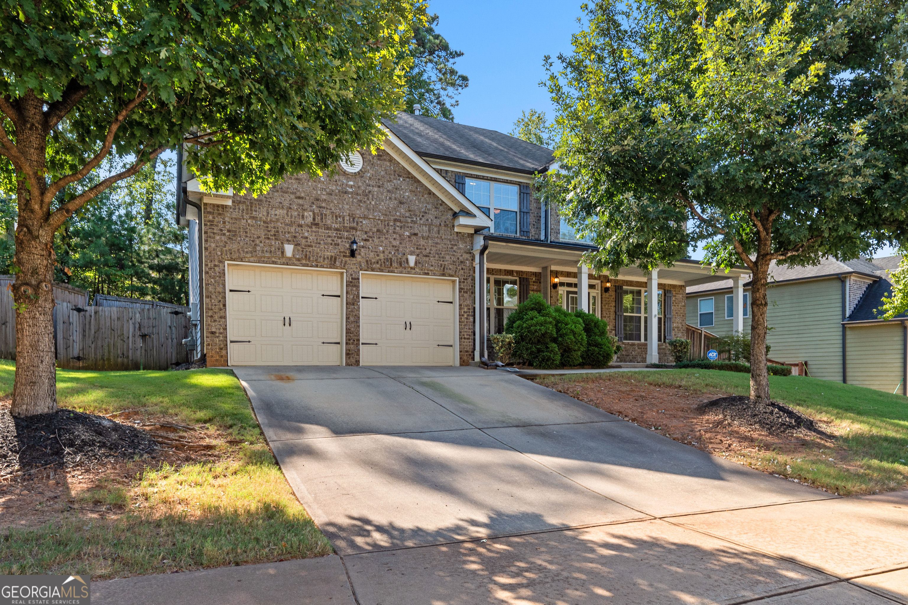 Welcome to this beautiful 4 bedroom, 3.5 bathroom home offering comfort, space, and modern convenience. The inviting brick front exterior and double garage set the tone for what's inside. Step through the front door to find a cozy sitting room/flex space to the right and a formal dining room perfect for gatherings. The spacious family room features a fireplace, creating a warm focal point for relaxing evenings. The chef's kitchen boasts a large island, breakfast area, and walk-in pantry, making both everyday meals and entertaining a breeze. Upstairs, the oversized primary suite is a true retreat with a walk-in closet, spa-like bath with double vanity, walk-in shower, and separate soaking tub. The convenience of the washer and dryer upstairs adds ease to daily living. Three additional bedrooms and well-appointed bathrooms offer plenty of room for family or guests. Enjoy the outdoors in your private fenced backyard, perfect for pets, play, and entertaining. This home combines thoughtful design with sought-after features in a fantastic Newnan location.