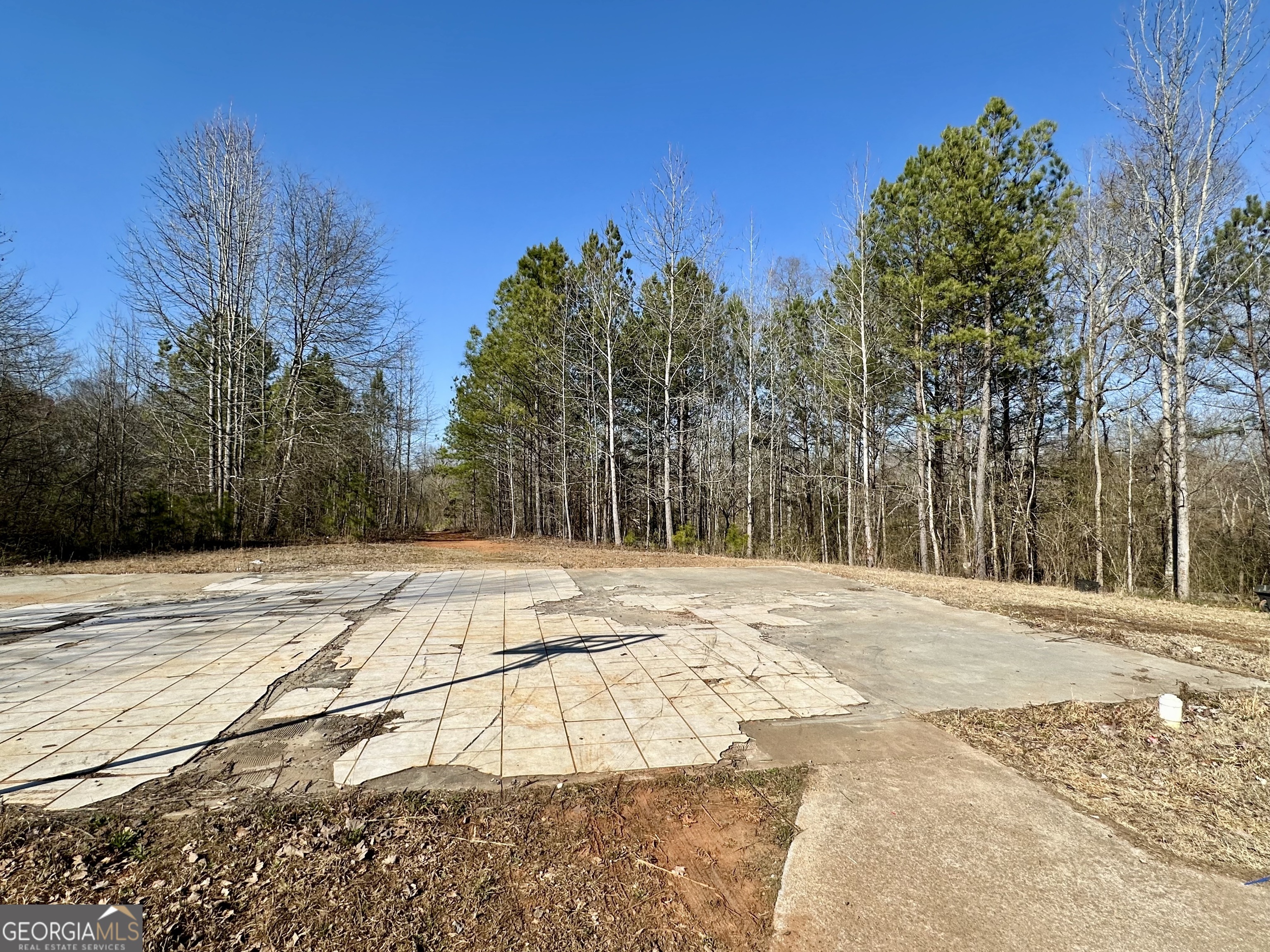 Owner financing available with down payment! Cleared .53 acre residential lot zoned for single family or duplex that backs up to the greenbelt. Once a duplex and now cleared for a new building to be constructed! The double driveway and the foundation are still in place, and it is already plumbed for city sewer. Options - Build a single family home or build to live in one side and rent out the second unit or receive passive income for both units! Take a look today before the opportunity is gone!