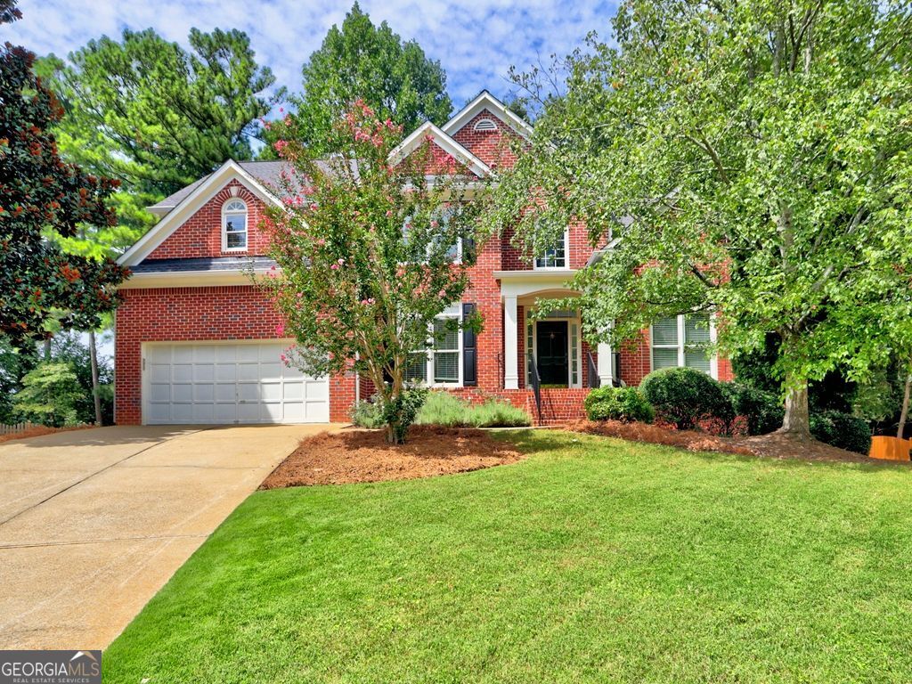 Updated traditional on private cul-de-sac in walkable Northampton! Formal liv/dining rooms, office with French doors and Master on Main! Kitchen with stainless steel appliances and wine cooler bar area opens to two story great room with fireplace and built in cabinetry! Master bedroom suite with Upgraded master bath with newer tile shower and walk in closet! Three unique upper-level bedrooms and full bath! Terrace level features 3 large rooms, full bath, workshop area and plenty of additional storage! Hardwood floors throughout main level, newer carpet and paint! Large level wooded lot, newer cement siding and gutters! Close to schools, shopping, Cobb aquatics and tennis and parks, library, arts and senior center!