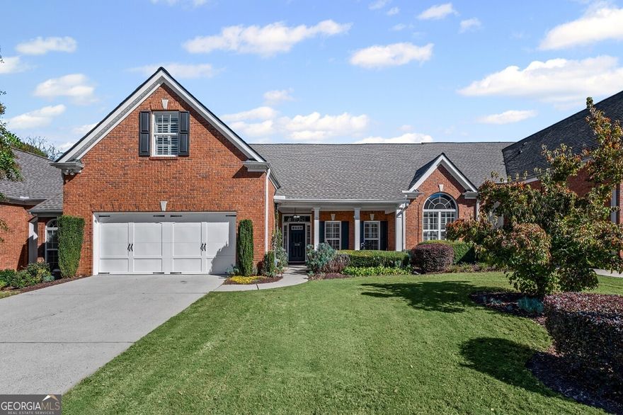 This beautifully refreshed Claremore Lake home is ready for you!  It's been freshly painted throughout and has brand-new flooring in the main-level common areas. Everything feels light, bright, and ready for you to move right in. From the step-free entrance, you're welcomed into an open foyer that flows seamlessly into the den and kitchen which is perfect for gatherings, entertaining, or simply relaxing at home. The primary suite on the main level is a peaceful retreat with vaulted ceilings and a tranquil view of the private back patio with great landscaping. Another spacious bedroom and a full bath complete the main floor, while upstairs offers a versatile third bedroom with its own private bath which is ideal for guests, an office, or hobby space. Life in Claremore Lake is all about ease and connection. Enjoy a clubhouse, pool, exercise room, lawn care, exterior maintenance, and planned social activities, giving you more time to simply enjoy your surroundings. Step outside your door and walk to shopping, dining, and Onelife Fitness, or take a short drive to Downtown Woodstock and I-575 for even more convenience. With new roofs installed by the HOA in 2022, you can move in with confidence and peace of mind. This isn't just a house... it's a low-maintenance lifestyle, ready and waiting for you to make it your own.