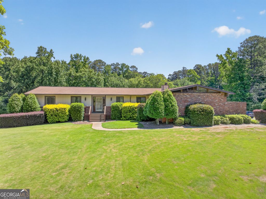 Photo of 1738 Rivermist Drive SW, Lilburn, GA 30047 (MLS # 10766343)
