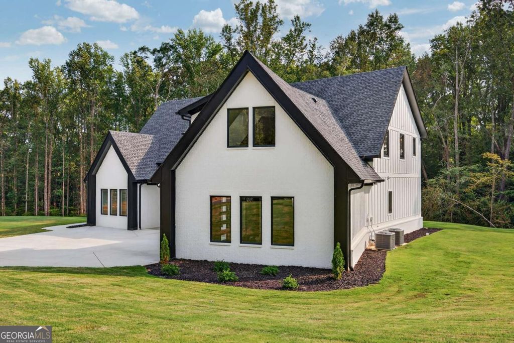 Photo of 127 Deer Canyon Dr, Auburn, GA 30011 (MLS # 10709187)