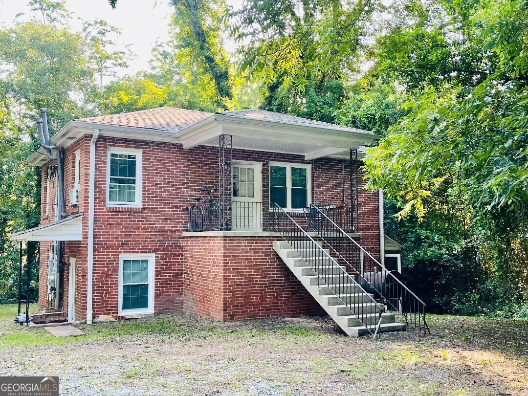 Investment opportunity awaits with this impressive 4-side brick duplex, perfectly suited for a large family or a savvy investor. The property comprises two distinct living areas. The upstairs unit is currently leased to a reliable, long-term tenant who is eager to remain. The lower level is also leased. Each level offers 2 bedrooms, 1 bathroom, a kitchen/living area, and a laundry room. This outstanding property generates substantial income and is meticulously maintained. Please be advised that viewings are only possible during Due Diligence, and we appreciate your discretion in not disturbing the tenant
