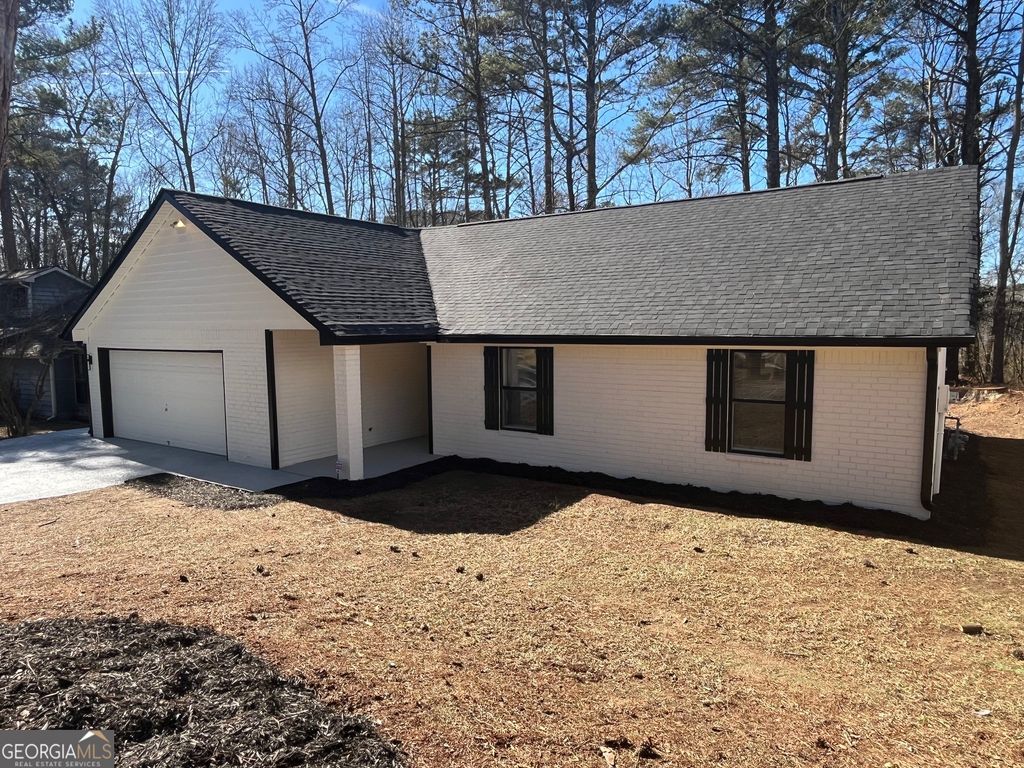 Photo of 8869 Habersham Drive, Jonesboro, GA 30238 (MLS # 10676997)