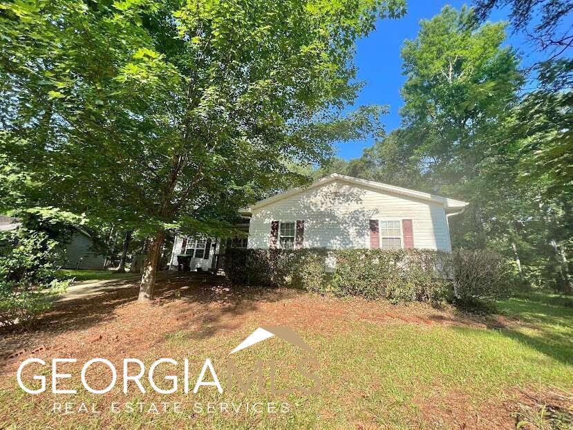 Introducing a practical and versatile 4 bedroom, 2 bathroom home, providing ample space for your family or potential renters. With no HOA fees to worry about, you have the freedom to use the property as a rental investment or as your personal residence. Inside, you'll find a comfortable family room with a fireplace, creating a cozy atmosphere for relaxation and quality time with loved ones. The fireplace adds a touch of warmth and charm to the space, making it a perfect spot to gather around during cooler evenings. Situated on a generous 0.63-acre lot in a quiet neighborhood, this home offers a peaceful environment away from the hustle and bustle of city life. The brick paver patio provides a practical space for outdoor dining, allowing you to enjoy meals in the fresh air and make the most of your backyard. Whether you're looking for a property to rent out or a place to call your own, this home provides a solid foundation for your needs. Its unpretentious features and serene surroundings make it a sensible choice for those seeking a comfortable and practical living experience. Don't miss out on the opportunity to make this house your next home. CASH and CONVENTIONAL ONLY!