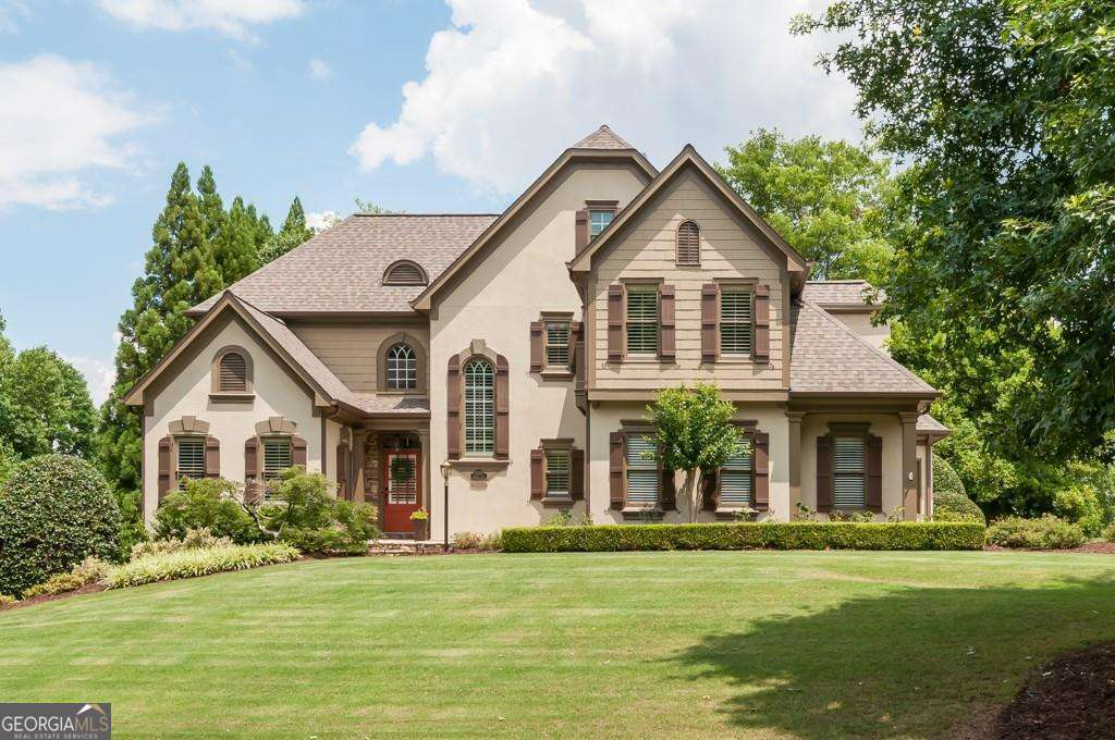 Welcome to this stunning home in the sought-after, gated Laurel Springs Golf Community. Featuring contemporary upgrades throughout, this residence offers an exceptional blend of style, comfort, and functionality. Step inside to find new hardwood floors, fresh paint, and plantation shutters. The open-concept kitchen boasts granite countertops, white cabinets, stainless steel appliances, an island, and a large breakfast bar - perfect for everyday living and entertaining. The vaulted office with exposed beams and French doors provides a stylish workspace. The main-level master suite includes a beautifully updated bath with a clawfoot tub, natural stone finishes, and custom cabinetry. The full finished terrace level with its own kitchen is ideal for an in-law suite, guest quarters, or recreation space. Forget about yard maintenance (provided by owner!) and enjoy outdoor living on the two-level composite deck, overlooking serene surroundings. The circular driveway adds convenience and extra parking. Community amenities include golf, two swimming pools, pickleball, tennis, fitness center, clubhouse, multiple dog parks, and more - all within a vibrant, active neighborhood with 24 hour onsite security and walking distance to the top schools in the Georgia. Additional Details: YARD MAINTENANCE IS INCLUDED FREE OF CHARGE (paid by owner!) Garbage/Recycling, Termite/Pest Control Service included in rent (paid by owner). Refundable pet deposit: $500 per pet (over 40lbs. negotiable). Monthly pet fee: $100 per pet (over 40lbs. negotiable). Available in September - schedule your private showing and experience Laurel Springs living at its finest! We require proof of income and verified previous rental history. Key Renter reports rent payments to Credit Bureaus to help tenants establish history. Please Note: All of the information contained within this ad is deemed reliable but is not guaranteed. Keyrenter Atlanta Property Management, LLC is a licensed real estate broker. ALL TENANTS MUST OBTAIN RENTERS INSURANCE WHILE OCCUPYING THE PROPERTY If you decide to apply for one of our properties, there is a $65 per adult application fee that is non-refundable. Anyone aged 18 or above who will be residing at the property must apply. We will (1) check your credit report; (2) check for any past evictions; (3) verify your employment, if applicable; (4) personal income must be sufficient and verifiable; (5) verify your previous landlord references; and (6) perform a criminal background screening. Qualifications include 2 years of good rental history, satisfactory credit, suitable background, and 2.5x income. Call to schedule a showing or inquire online at KeyrenterAtlanta. BASICS * Availability: September, 2025 - please inquire with preferred move-in date. *YARD MAINTENANCE IS INCLUDED FREE OF CHARGE (paid by owner!) *Garbage/Recycling, Termite/Pest Control Service included in rent (paid by owner).Pets Allowed: Cats and small dogs are welcome with breed restrictions. * Laundry room: Main floor adjacent to Master Suite, washer and dryer hookups * Parking: Garage and circle driveway * Lease Term: 1 year, 2 years IMPORTANT THINGS YOU SHOULD KNOW * No Smoking in main house/garage, acceptable on three outdoor patios and two decks. * Application Fee is $65 per Adult, Non-Refundable. Please review Keyrenter's Application Criteria prior to applying. Application turn around time is 1-2 Business days. * Security Deposit: One Month's Rent + $100 nonrefundable Leasing Fee due at move-in. * $20 monthly MRA fee