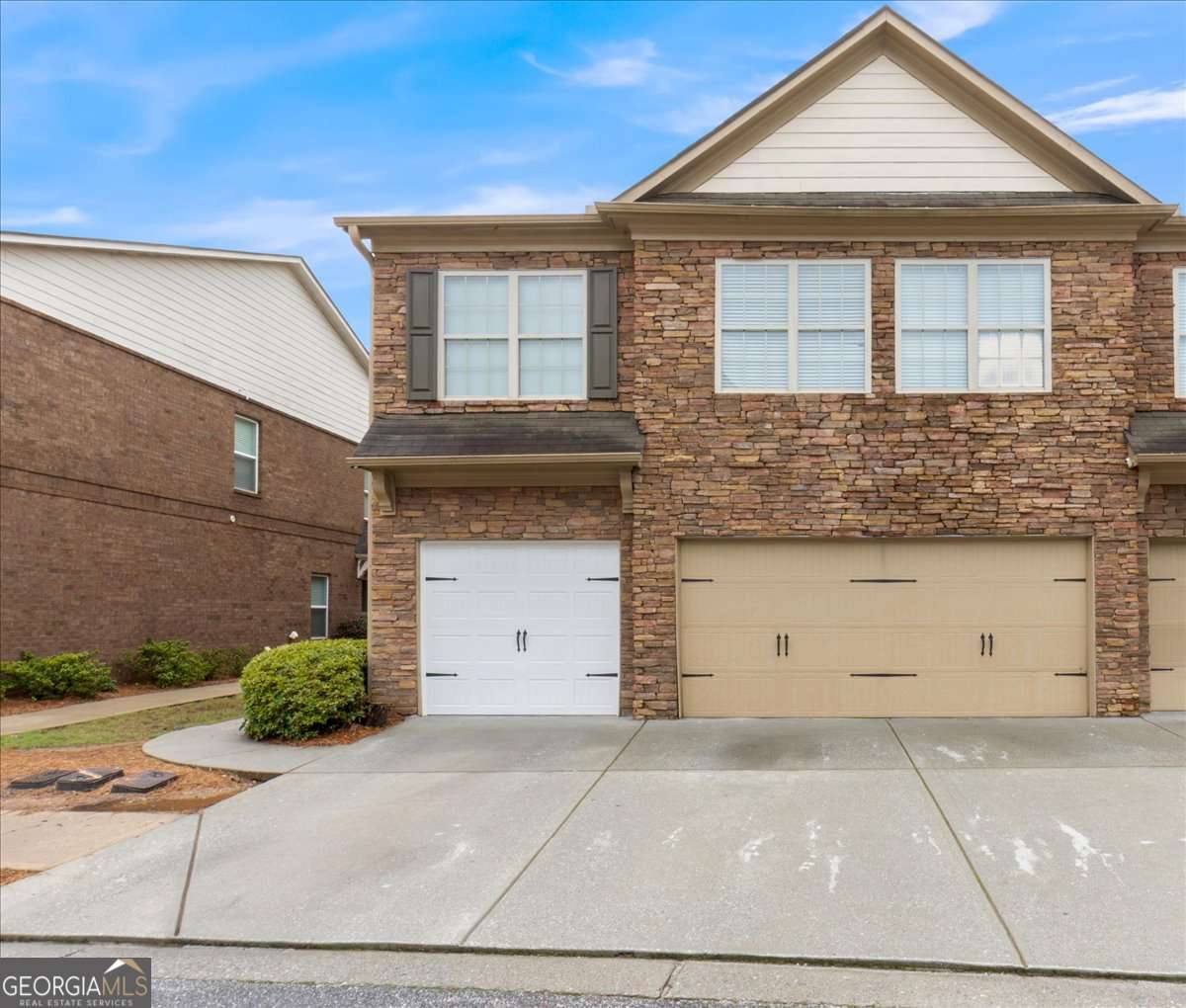 Welcome to low-maintenance living in the heart of Lilburn! This charming 3-bedroom, 2.5-bath townhome in a gated community offers comfort, convenience, and a smart layout perfect for everyday living or a great investment opportunity. Step inside to an open concept main floor with a spacious living room, dining area, and kitchen with plenty of counter space. All 3 bedrooms are upstairs. Enjoy the private back patio-ideal for morning coffee or relaxing evenings, and take advantage of a rare two-car garage-a valuable feature for added storage and parking. Located just minutes from I-85, shopping, restaurants, and top Gwinnett schools, this home combines convenience and value. Whether you're a first-time buyer, downsizing, or looking for a rental-friendly property, this is one to see! And NEW HVAC system! ALL ELECTRIC!!!