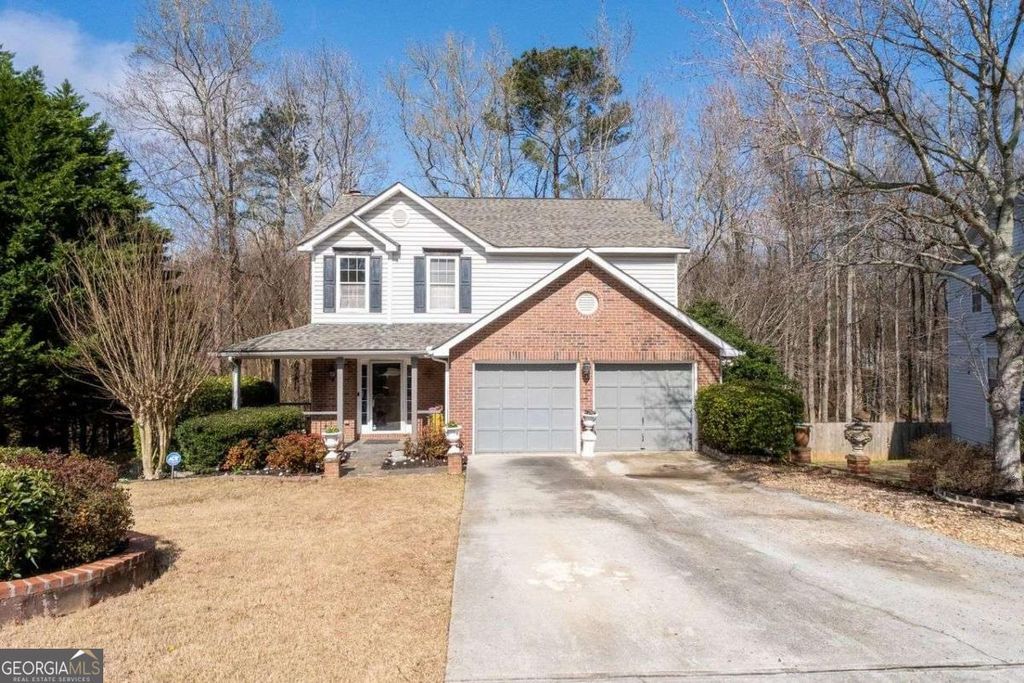 Photo of 780 Walnut Creek Drive NW, Lilburn, GA 30047 (MLS # 10707673)