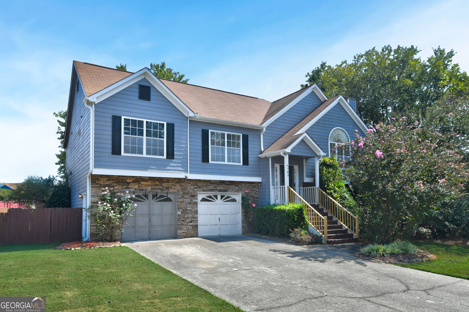 Charming 4 Bedroom Home in Powder Springs Welcome to this spacious 4 bedroom, 3 bath home in a friendly swim and tennis community! With new carpet and hardwood on the main floor and a newer roof, HVAC, and furnace, you'll have peace of mind knowing the big updates are already done. The floor plan offers plenty of room for everyone to spread out, while still keeping that warm, inviting feel. Whether you are enjoying the open dining and living area and three sizable bedrooms on the main floor or if you venture down to the basement area where a kitchenette, very large entertainment room and bedroom await. There is a separate porch area off of the basement bedroom that is perfect for morning coffee or an evening respite. The fenced yard is perfect for gatherings, pets, or weekend barbecues, giving you space to enjoy the outdoors right at home. This neighborhood is all about community-whether it's splashing in the pool, hitting the tennis courts, enjoying the trails or just spending time with neighbors. Plus, you're close to great schools, shopping, and dining. If you're looking for a comfortable, move-in ready home with lots of room to grow and make memories, this one is it!