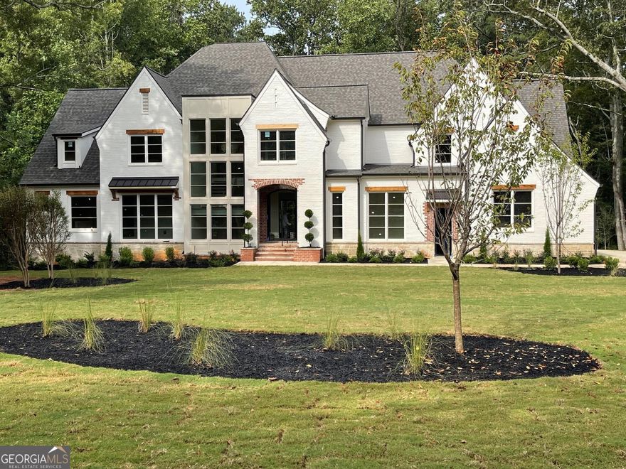 Fabulous new Estate Home is under construction on an gorgeous lot close to Alpharetta Square and Avalon. Large level estate lot on 1.41 acres. Acclaimed Builder Kamran Jalali owner of KJ Luxury Homes LLC is building a beautiful Transitional home.  Approximately 5882 square feet finished above grade and 3102 below grade. This spacious lot has plenty of room for a walk out pool or tennis/sport court. If you hurry you can customize this home with your personal specifications. You can be one of the privileged few with a large private estate close to world class dining, shopping and entertaining. Don't miss out on this rare opportunity. KJ Luxury homes has additional lots close to the Alpharetta square in various sizes and price points. You can increase the size of the home if desired. Price can be determined once the size is confirmed. If you want a larger home built no worries. We can price a larger home based on your requirements. Lot 1 is currently under construction for $3.4m and is available for purchase. It should be completed in August 2024.
