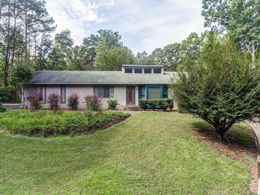 PRICED TO SELL! A handyman's dream and with a little vision this 3-bedroom two full bath RANCH can be yours. Yes, it needs paint. Yes, it needs flooring in the bedrooms. Yes, it needs some updates and a little love but oh how sweet it will be to have privacy on 1.22 acres. Large 30x30 detached garage is perfect for all the extra vehicles, ATV's or golf cart. Not to mention all the space you need for a workshop and or storage. Did I mention that its only a short distance to Woodland Golf Course? Schedule your showing today for this little hidden gem because it will not last long. Home is being offered AS-IS.