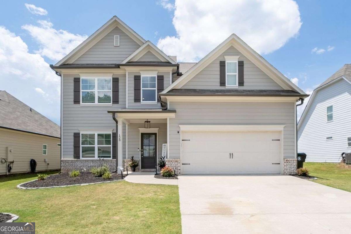 Nestled on a peaceful cul-de-sac in the vibrant Creekstone community, this better-than-new home offers 4 bedrooms, 2.5 baths, and 2436 sq ft of refined living space - a perfect blend of style, space, and convenience. The main level features luxury vinyl flooring throughout, an open-concept kitchen with white cabinetry, granite countertops, wrought iron railing, and a spacious family room with ceiling fan. Upstairs you'll find four generously sized bedrooms, fresh new carpet, and an oversized shower in the owner's suite. Enjoy upgraded interior washable paint in neutral tones, ceiling fans in both the family room and primary suite for added ease. Step outside to a private, fenced backyard with a charming pergola patio - ideal for relaxing or entertaining. Commuters and adventurers alike will love the location: positioned just off GA-400, this home provides swift commuting towards Dawsonville. The cul-de-sac location enhances safety and minimizes traffic noise, while ensuring easy access to Hwy 53 and Perimeter Road - making daily travel and errands seamless. This home offers outstanding value at a price per square foot that's below the local average - delivering more square footage and modern finishes at a lower price per foot! Nearby amenities include dining and shopping at Dawsonville's local favorites, outdoor adventures at Amicalola Falls State Park, hiking trails and waterfalls, Atlanta Motorsports Park, shop at GA Premium Outlet Mall, and convenient library access. The home is also close to highly rated schools and just minutes from GA-400 for easy commuting.