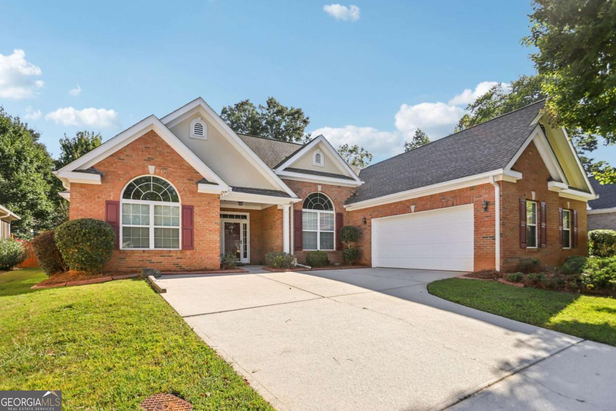 Move-in ready home in the desirable Cedar Grove Lake community! This single-story, split floorplan features 4 bedrooms and 3 baths, including an owner's suite with a cozy fireplace. Enjoy a bright, open layout, fireplace in living room, formal dining area, new dishwasher, and HVAC. Community perks include a clubhouse, pool, tennis courts, playground, park, and lake access-perfect for families and outdoor fun. Tucked away for peaceful living but just minutes from the airport and local amenities. Comfort, style, and lifestyle all in one-don't miss out!