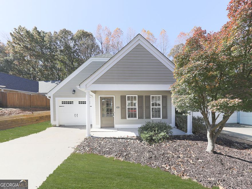 Welcome to The Cottages at Baker Road, a delightful and tranquil gated community in Acworth designed for those seeking a peaceful, low-maintenance lifestyle. Enjoy the convenience of an HOA that takes care of the gate, lawns, roof, exterior maintenance, and common areas. This step-less ranch home is in a friendly neighborhood that is ideally located near parks, shopping, and dining. Less than two miles from I-75, this move-in-ready cottage is perfectly situated for easy access. Step inside to find a bright, open floor plan bathed in natural light. The spacious kitchen boasts beautiful cherry cabinetry, generous counter space, and a pantry, seamlessly flowing into the living and dining areas-perfect for entertaining. Outside, your private courtyard provides a relaxing retreat and a secure area for pets to explore. The generous primary suite features a cozy sitting area, which can serve as a home office, reading nook, or workout space. The en-suite bathroom is equipped with cherry cabinetry, a dual vanity, a large walk-in closet, and a linen closet for added convenience. A well-sized second bedroom is located adjacent to a full guest bathroom that doubles as a convenient powder room. This charming cottage combines comfort and style in a vibrant community, all without the limitations of age restrictions. Don't miss out on the opportunity to call this beautiful home your own-schedule your showing today!