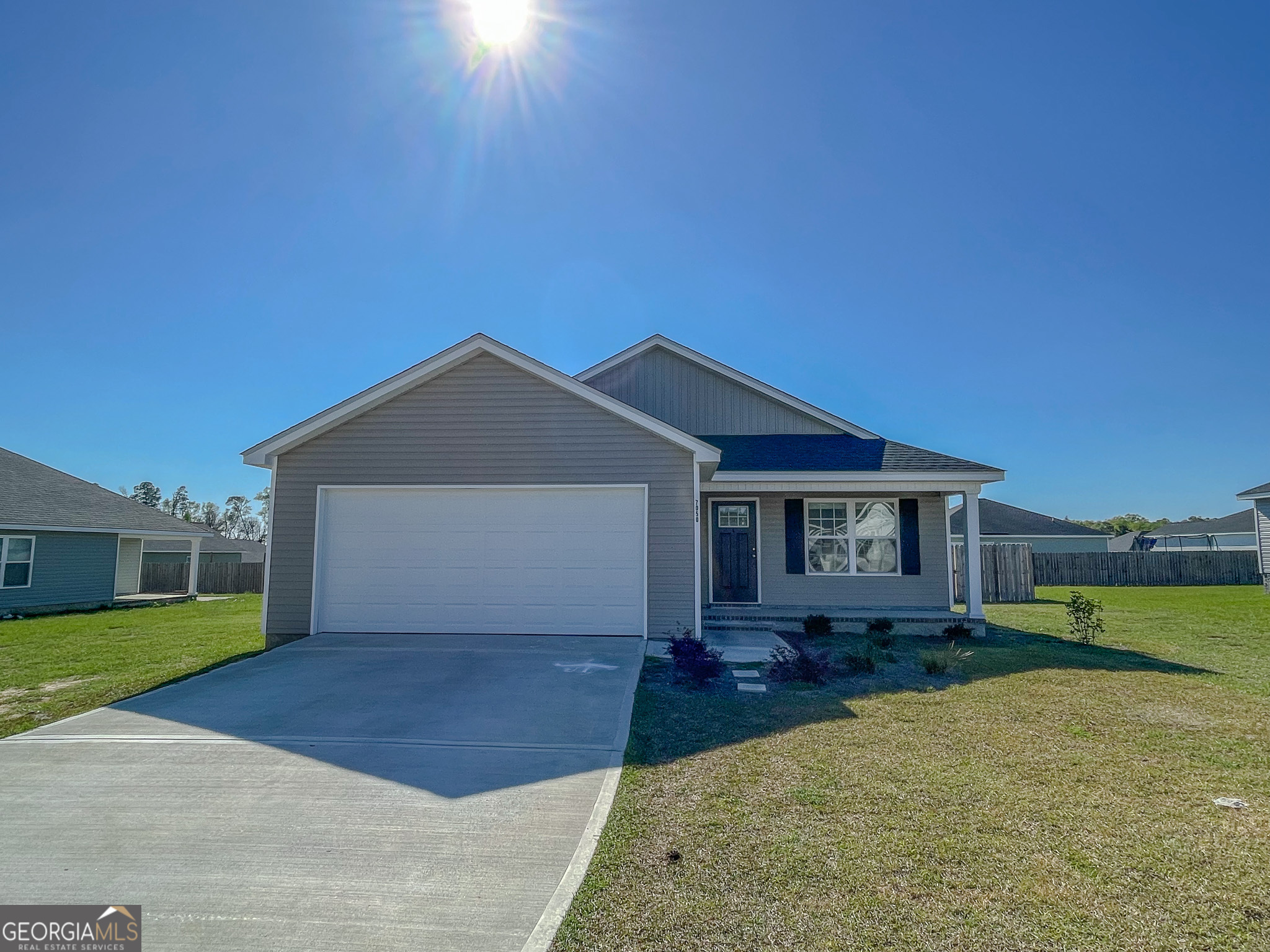 This charming home features an open-concept layout with a seamless flow from the kitchen to the living room-perfect for entertaining. Enjoy durable LVP flooring throughout the common areas and cozy carpet in the bedrooms. The kitchen is equipped with stainless steel appliances and plenty of cabinet space. The spacious master suite is located on the main level and includes a huge walk-in closet and an updated master bath with stylish accent walls. Step outside to a fenced-in backyard with a covered back porch, ideal for relaxing or hosting guests. Conveniently located near Georgia Southern University, shopping, and dining in Statesboro.