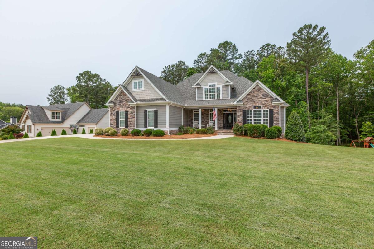 This home was built in 2017 and has 3034 finished sq ft with an additional 2245 sq ft of unfinished basement space, which includes a storm shelter! 4 bedrooms + a super large bonus room, and 3 full baths + a guest bathroom. The primary bedroom is on the main level along with 2 additional bedrooms, office, dining room, laundry room, drop-zone for coats & shoes, and a large open kitchen with eat-in area and breakfast bar! The kitchen has real-wood, custom cabinets, granite countertops, and workspace for everyone to help. The great room has a beautiful fireplace, tall, coffered ceilings, built-in bookshelves, and extra-tall, sliding glass doors to the enlarged back porch with another fireplace and extended ceilings. The primary bedroom has a massive on-suite with long vanity, storage tower, huge walk-in shower, private toilet, and expansive walk-in closet. The two additional bedrooms on the main level share a full bathroom with tile shower. Upstairs is a bonus room- over the 3-car garage- to give you an idea of just how big that room is! The 4th bedroom and a full bathroom, also with tile shower, are upstairs which could be a good space for privacy. The basement is yours to create your own personalized space, and is plumbed for a bathroom! New carpet, Roof is only 8 years old. The back deck will be re-stained or a credit given to the buyer at closing. Note- the septic is in the front yard so there is a room for a pool, if you desire! The front and back yard have sprinkler system. The Estates of Beaconsfield is an established neighborhood districted to Northgate HS, Madras Middle, and Canongate Elem. Beaconsfield offers a: pool, tennis/pickleball court, basketball court, playground, sidewalks & street lights, and also a vast array of activities for the home-owners and kids like food trucks, easter egg hunts, visit from Santa, "Pub Crawl," etc. It's super convenient to schools, I-85 (approx 20-25 min to Hartsfield Jackson International Airport), Peachtree City, Newnan, and Senoia. Washer & Dryer, and Refrigerator are negotiable to convey.